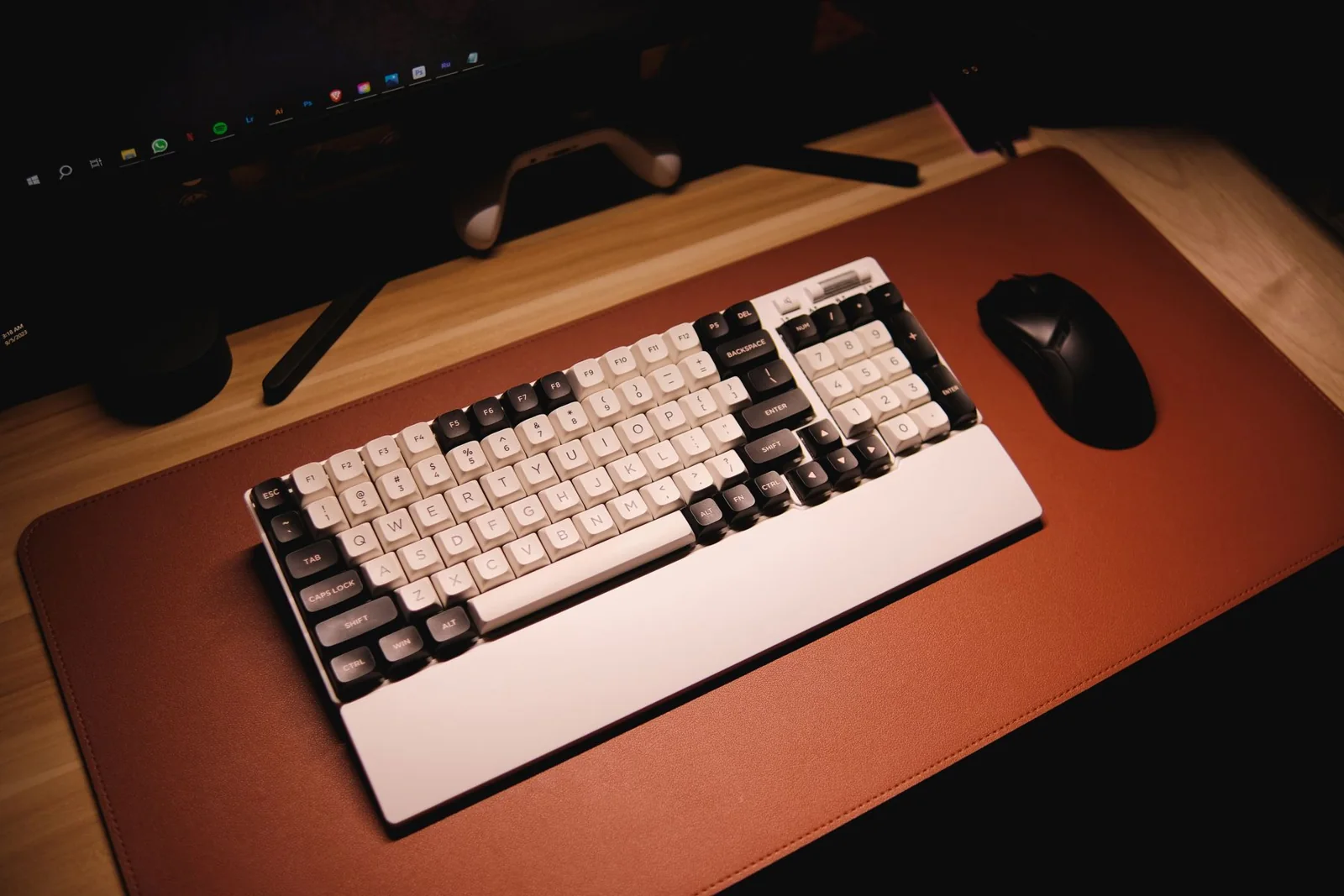 A keyboard and mouse on a desk in Antipolo, Philippines